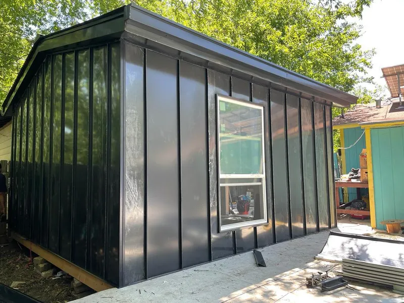 Black standing seam metal wall panels for Roof Inspection in Greenbrier